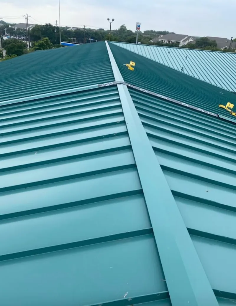 Green commercial metal roof ridge and valley for Metal Roof Repair in Metairie