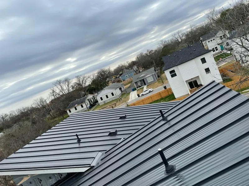 Standing seam metal roof panels with vents for Skylight Repair in Metairie